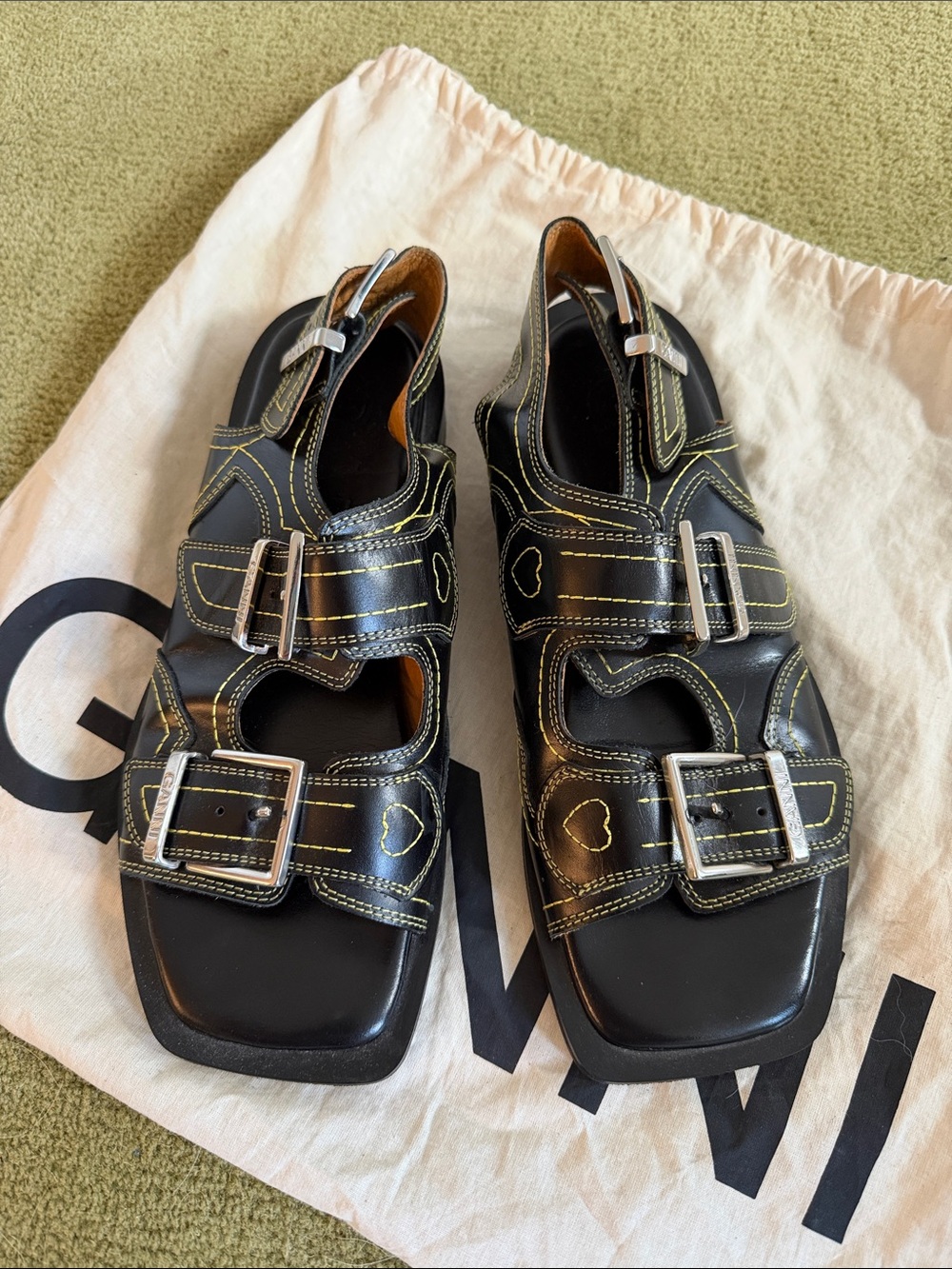 Ganni Black Leather Triple-Buckle Sandals with Heart Stitching - Picture 3 of 4